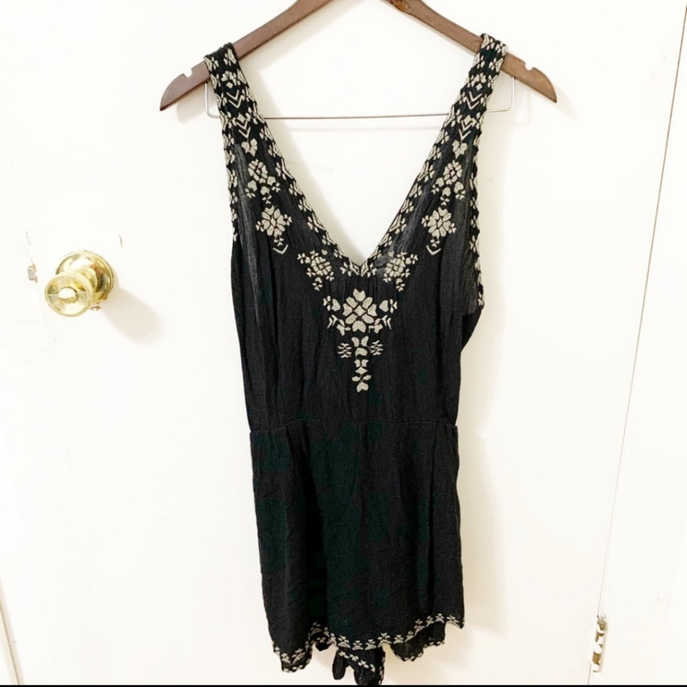 Free People Welcome to Miami black romper size 6